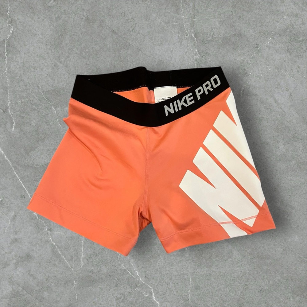 Nike Pro Women's Athletic Shorts in Orange and Black